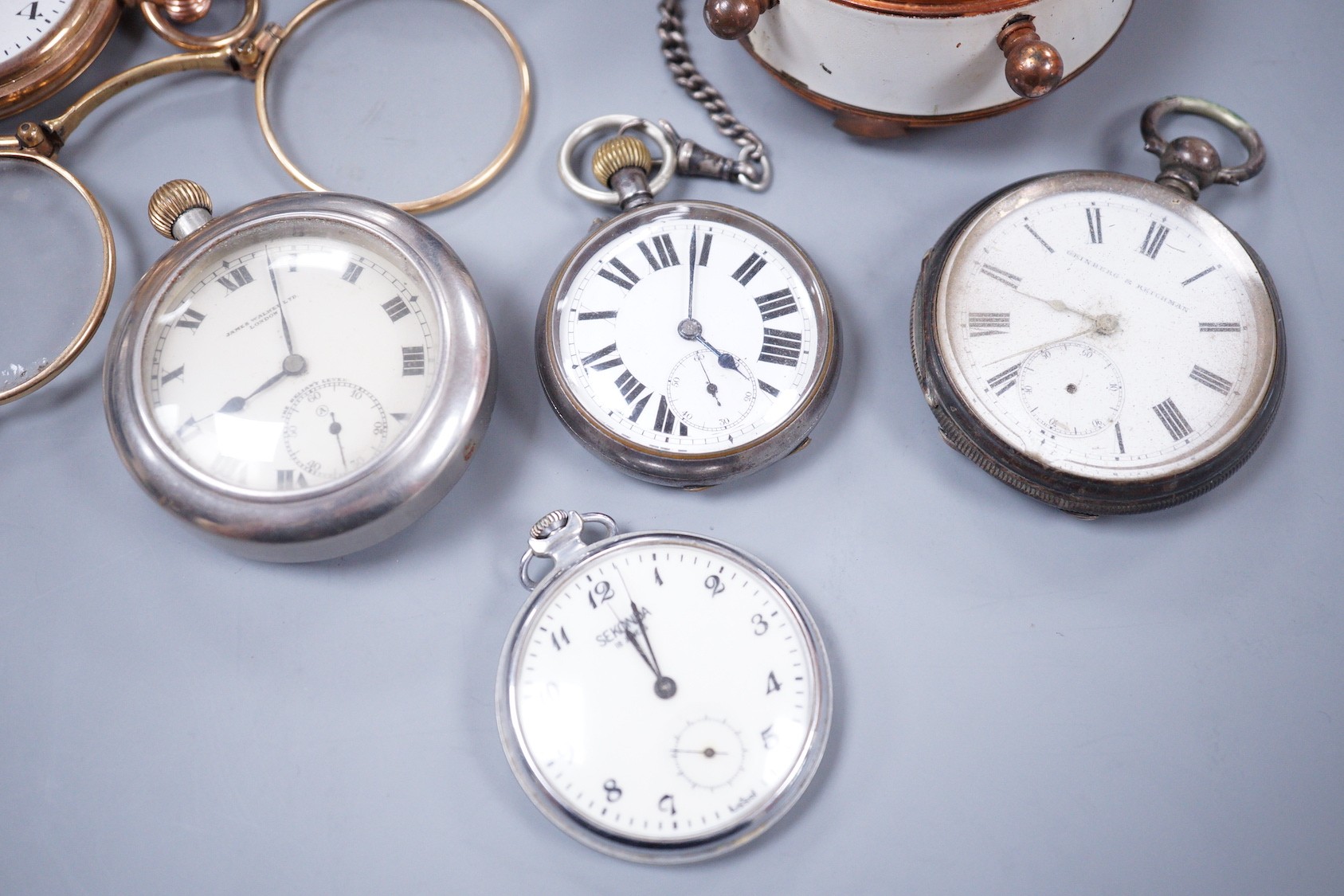 A small collection of six assorted pocket watches, including a silver open face, gun metal on a silver albert and gold plated, a Estyma alarm clock and a pair of gold plated lorgnettes.